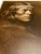 This is a striking framed photographic print of "A Zuni Governor," one of Edward S. Curtis's best-known portraits,...