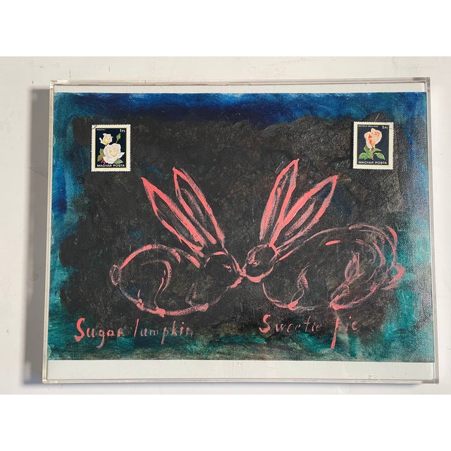 Abstract Moon Rabbits series Mixed media collage on canvas by Elia in a acrylic frame.