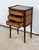 Charming little furniture all faces, composed of three identical drawers, each facade of which has a plating of Amboine...