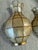 A sculptural pair of Italian wall sconces from the 1970s, beautifully crafted in the form of stylized vases. Each piece is...