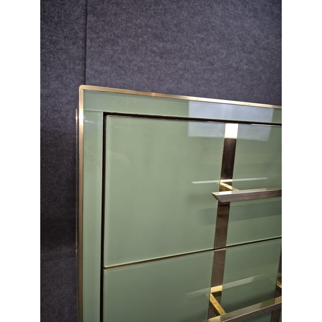 Magnificent Pair of Green Glass Bedside Tables Made in Italy Available These exquisite Green Glass Nightstands, produced...
