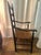 Early 1900's ladder back chair High back and double arms Web seating Good patina shows some use and wear Use as office...