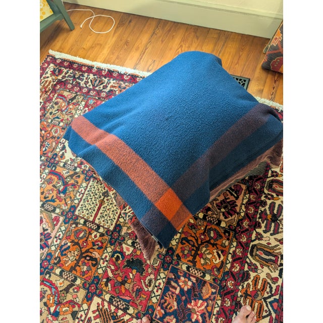 Woolrich Civil War Calvery reproduction blanket. Dark blue with an orange stripe. 85% wool/15% nylon 80x 66