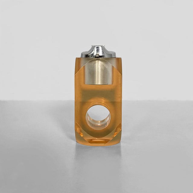 Italian acrylic glass and chrome-plated steel table lighter, 1970s Polygonal table lighter made of transparent acrylic...