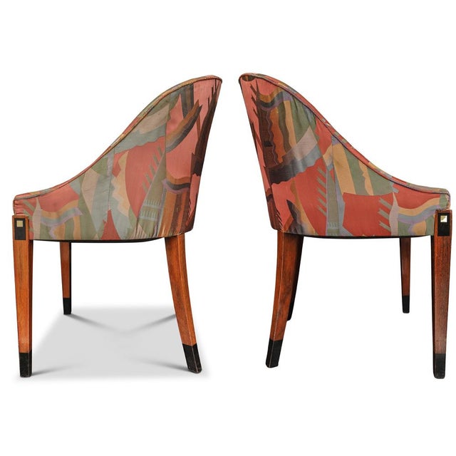 An Elegant Pair of French Art Deco tub chairs, raised on square tapered legs with ebonised and ivorine inlay with original...