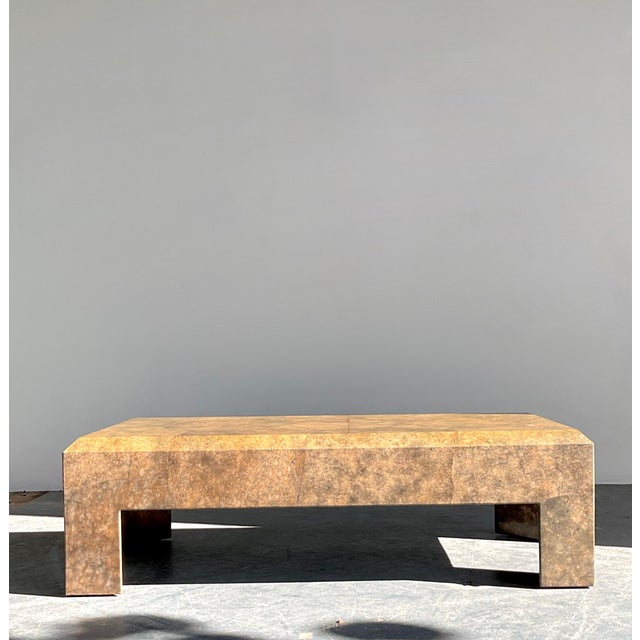 Imbue your living area with the understated luxury of this vintage Postmodern coffee table. Designed in the sophisticated...