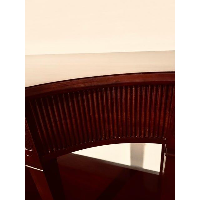 Harden cherry side board and I am the original owner since 2001. Beautiful style and detailing. Vintage piece in excellent...