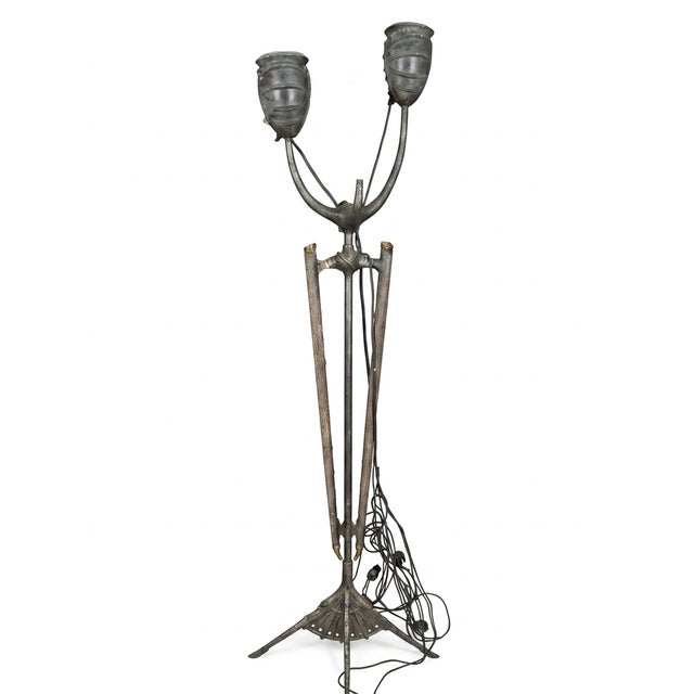 A monumental Hollywood studio torch sculpture of impressive scale and dramatic presence, standing approximately six feet...