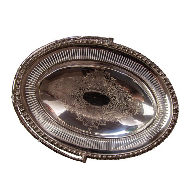 Lovely hollowware basket from Roberts and Belks, silverplated in the Sheffield style with a fully articulated handle. The...