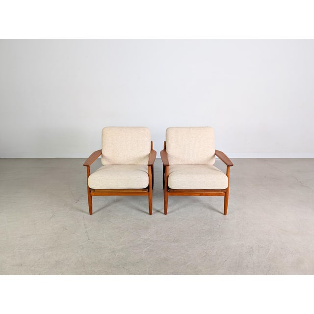 We are offering a beautiful set of two vintage armchairs from the 1960s for sale. Condition: Good used condition with age-...