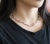 This retro style choker necklace is made from 18-karat white gold. The necklace features a total of 17.30 carats of...