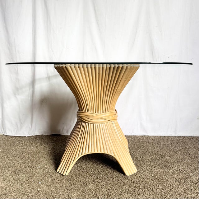 This Boho Chic McGuire-style dining table celebrates the timeless elegance of natural materials and sculptural design. The...