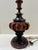 Vintage table lamp with tall turned standard and dramatic carved and inlaid wood body. Decorative geometric marquetry...