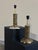 A pair of 'Aurora' table lamps, designed by Luciano Frigerio, Desio, from the 1970s. The stem, featuring an irregular,...