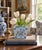 A charming mid-20th-century Dutch Delft porcelain flower frog or tulipiere, fashioned in a compact square form with five...