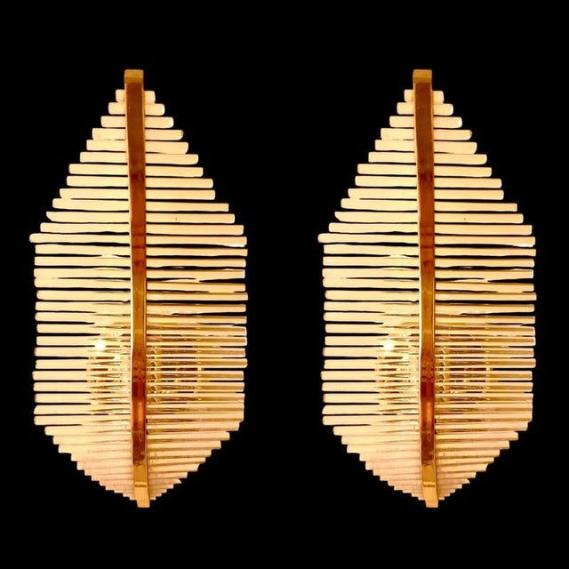 Exceptional G Sciolari wall lighting with tube Murano glass with gilded gold structure. The design and the quality of the...