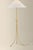 Statuesque and expressive, the Katya floor lamp adds graphic elements to an elongated form. Three curved legs with...