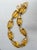 Metal Vintage 1980s Signed Givenchy Goldtone Amber Beaded Necklace For Sale - Image 7 of 7