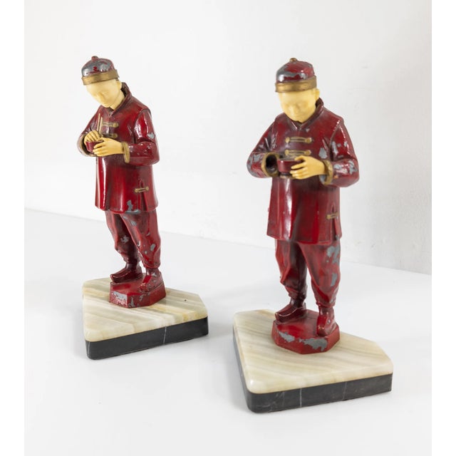 We are selling this cool pair of Art Deco French figures. These figures in white metal and paint are of Chinese men eating...