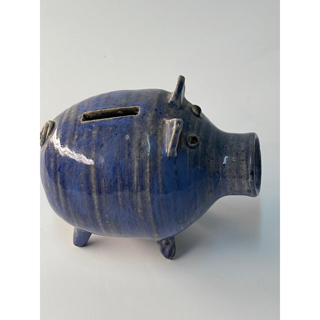 Cobalt blue glazed pottery stoneware pig: 4” high, 3” wide,5" deep signature not readable.