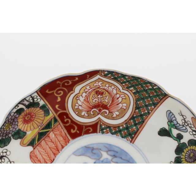 Circa 1860-80 lobed Imari Aesthetic Movement Plate, Japan. Exquisitely detailed decoration - cartouches over panels...