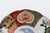 Circa 1860-80 lobed Imari Aesthetic Movement Plate, Japan. Exquisitely detailed decoration - cartouches over panels...