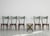 This set of six dining room chairs is similar to the design of ICO Parisi and is in its original condition. The straight-...