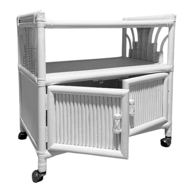 Vintage Palm Beach Regency rattan bar cart / cabinet featuring wrapped faux bamboo detailing, woven rattan accents, and...