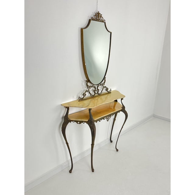 Elegant Mid-Century Italian console with mirror, 1950s Double top in "Portugal pink" quality marble. Good condition. The...