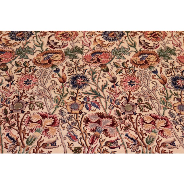 Designed with mesmerizing intricacy and gorgeous color palette, this hand-knotted masterpiece demonstrates the beauty and...