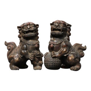 Pair of Vintage Chinese Gilt Bronze Foo Dogs – Buddhist Guardian Lions With Brocade Ball For Sale