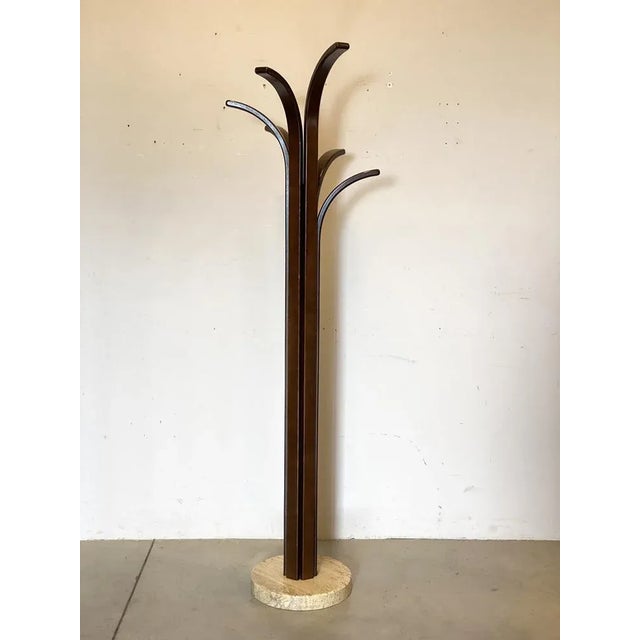 60s hangers in tinted ash and travertine wood.