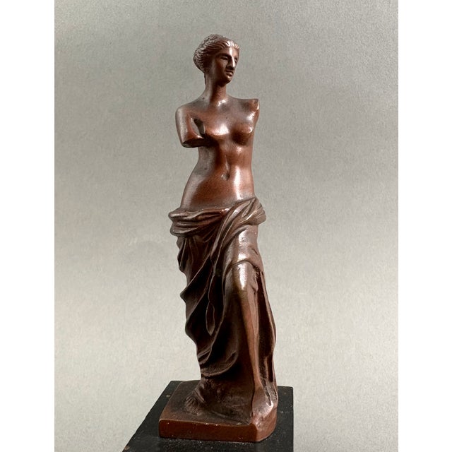 A pair of bronze statuettes depicting the Venus de Milo and the Diana of Gabii, France, second half of the 19th century....