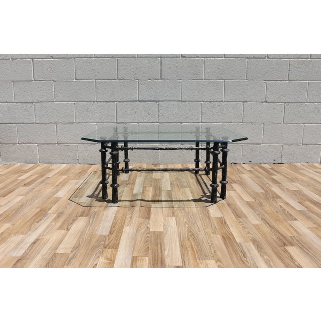 An exceptional vintage Giacometti-style coffee table showcasing a bold sculptural silhouette inspired by the iconic works...