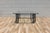 An exceptional vintage Giacometti-style coffee table showcasing a bold sculptural silhouette inspired by the iconic works...