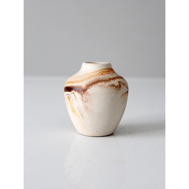Vintage Nemadji pottery mini vase featuring softly marbled cream, brown, and rust-toned veining that flows naturally...