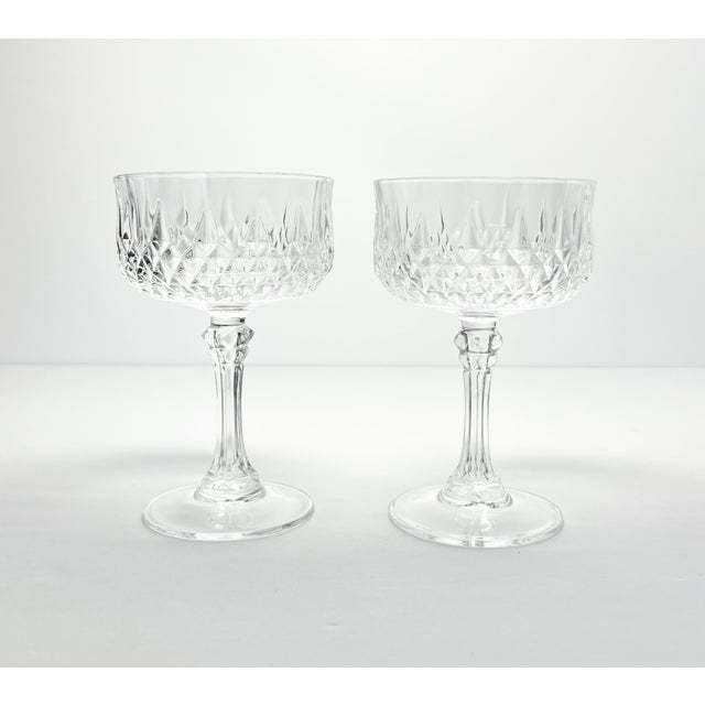 Cristal d’Arques “Longchamp” Pair of Crystal Coupe Champagne Glasses 5 1/2” 8oz Excellent condition. No chips, cracks, or...