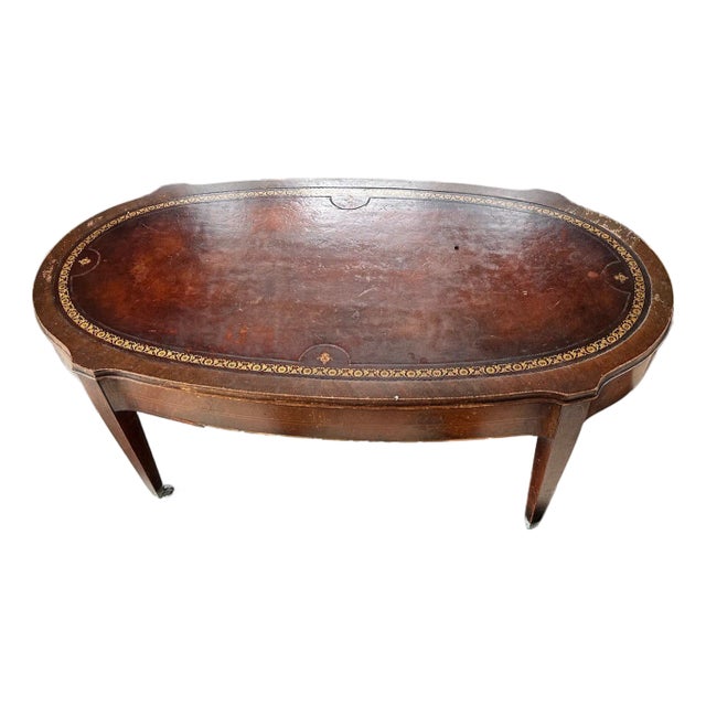 Antique Oval Coffee Table With Gold Tooling For Sale
