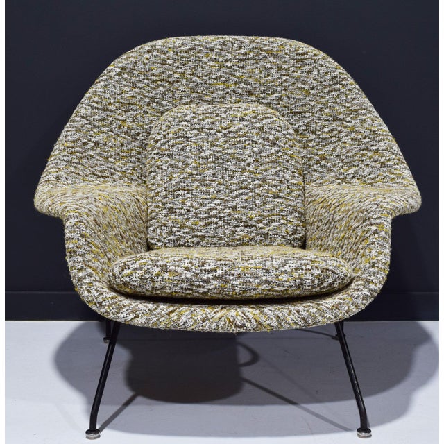 Discover the timeless elegance of the iconic Eero Saarinen for Knoll Womb Chair, now newly upholstered in exquisite French...
