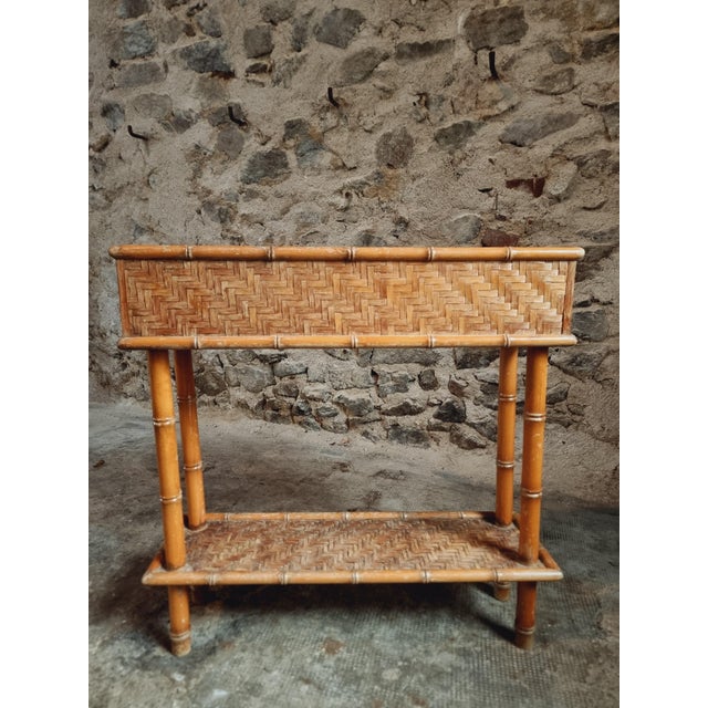 Add a touch of retro charm to your interior with this lovely vintage bamboo rack from the 1970s, sourced from France. with...