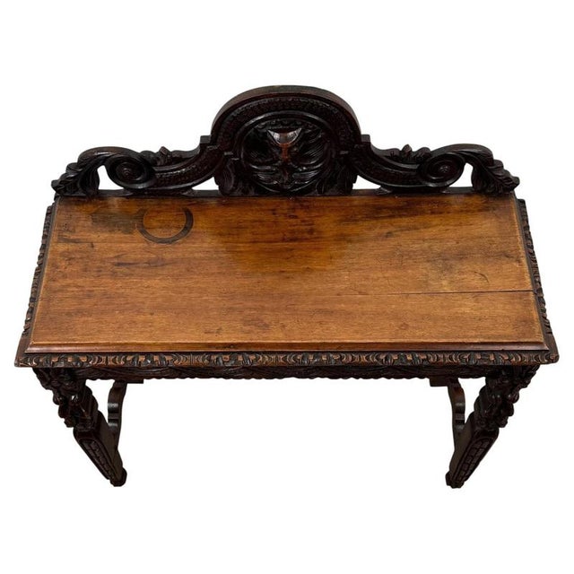 A striking and highly decorative 19th-century Victorian carved oak side table, displaying exceptional period character,...