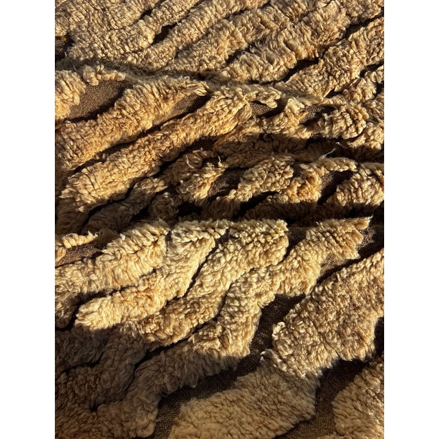 Discover the unique elegance of this handmade Moroccan Mrirt rug, designed with a minimalist grid of soft-textured . This...