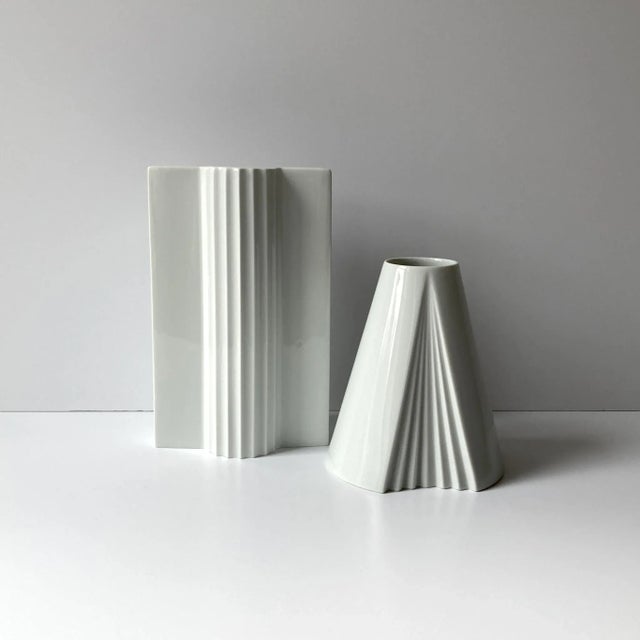 Pair of white vases including Thomas rounded pleat design and Rosenthal Plissee vase by Ambrogio Pozzi. The geometric...