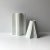 Pair of white vases including Thomas rounded pleat design and Rosenthal Plissee vase by Ambrogio Pozzi. The geometric...