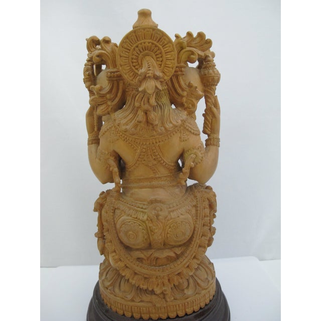 Seated Lord Ganesha Holding Fruit Carved Wood Hindu Deity God Statue on Pedestal For Sale In Portland, OR - Image 6 of 13