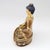 We rarely see gilt copper, but here' one. Everything but the head is covered in 24K gold. Head is gilt painted. Common in...