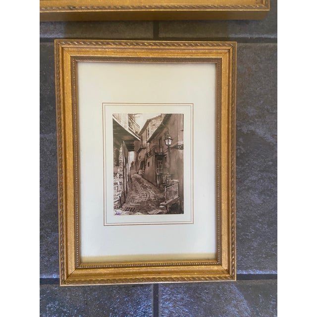 Pair of vintage European sepia-toned prints, professionally matted and framed, likely acquired during travel in Italy. One...