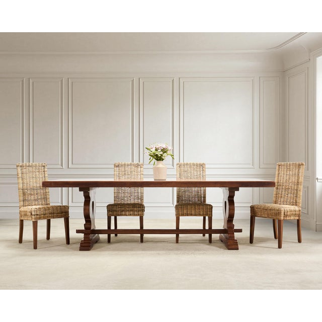 A grand and substantial 20th century oak trestle table built in the country French provincial farmhouse style. The table...