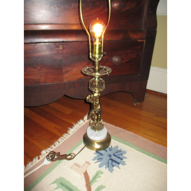 This is a Lovely Vintage Hollywood Regency Glam Cherub Table Lamp with Crystal and Marble and is in Nice Working Condition...