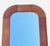 Midcentury Danish Modern teak wall mirror designed by C. Nissen Möbelfabrik. Original label attached.